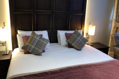 A double bed in one of our rooms