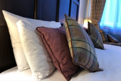 Pillows and cushions on a double bed