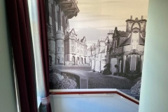 A wall mural of Edinburgh in one of our hallways