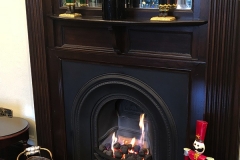 The fireplace in the lounge at Christmas