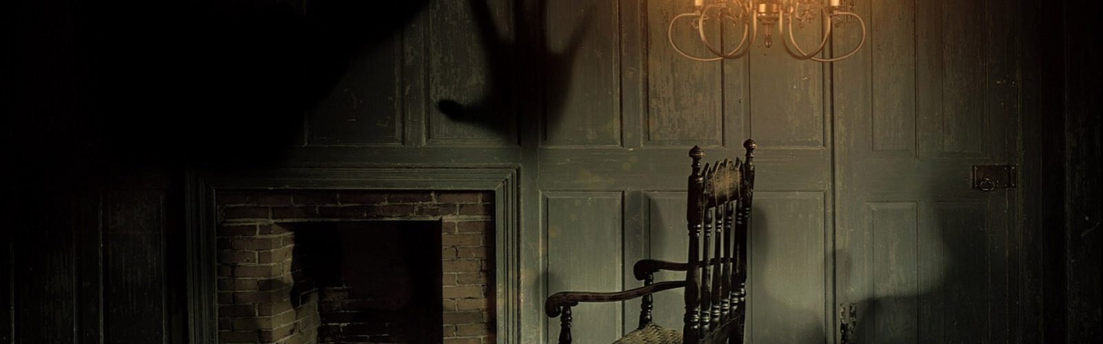 Shadows in a spooky room with a rocking chair