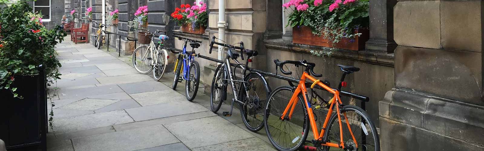Biked lined up outside a building in Edinburgh