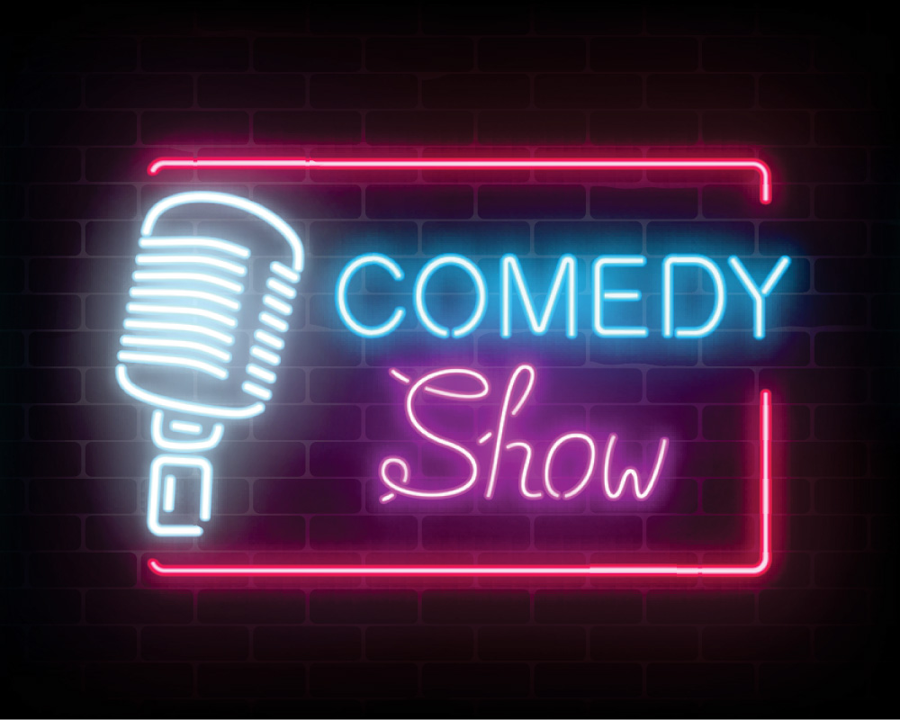 Comedy Show neon sign on the wall