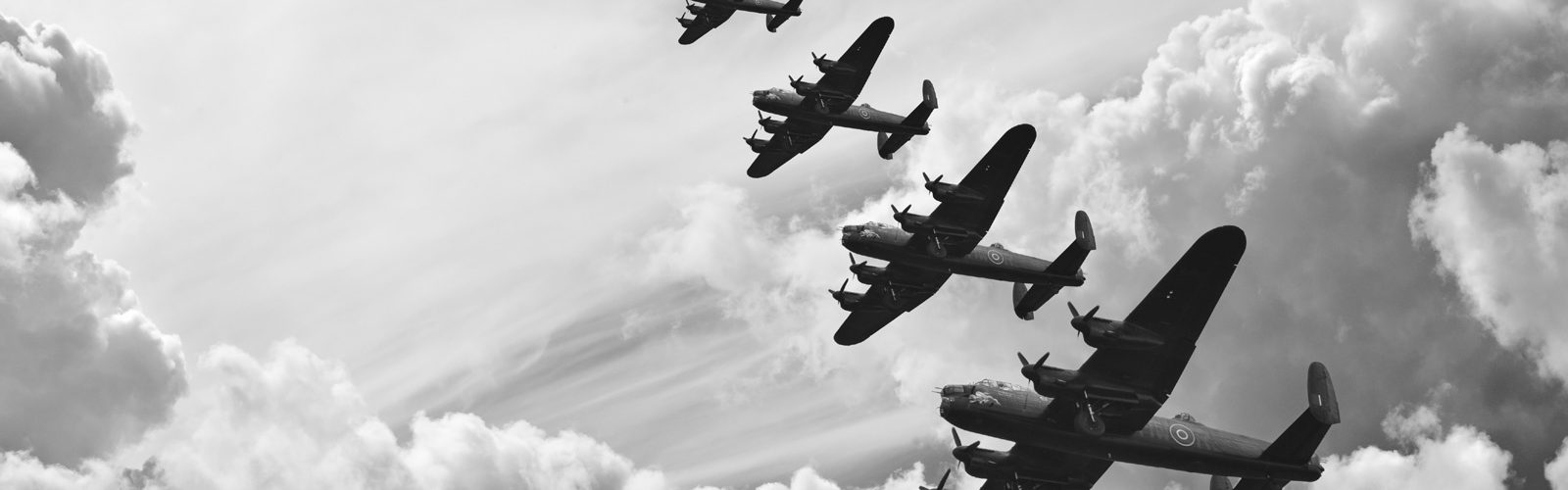 Four Lancaster Bombers flying through the air