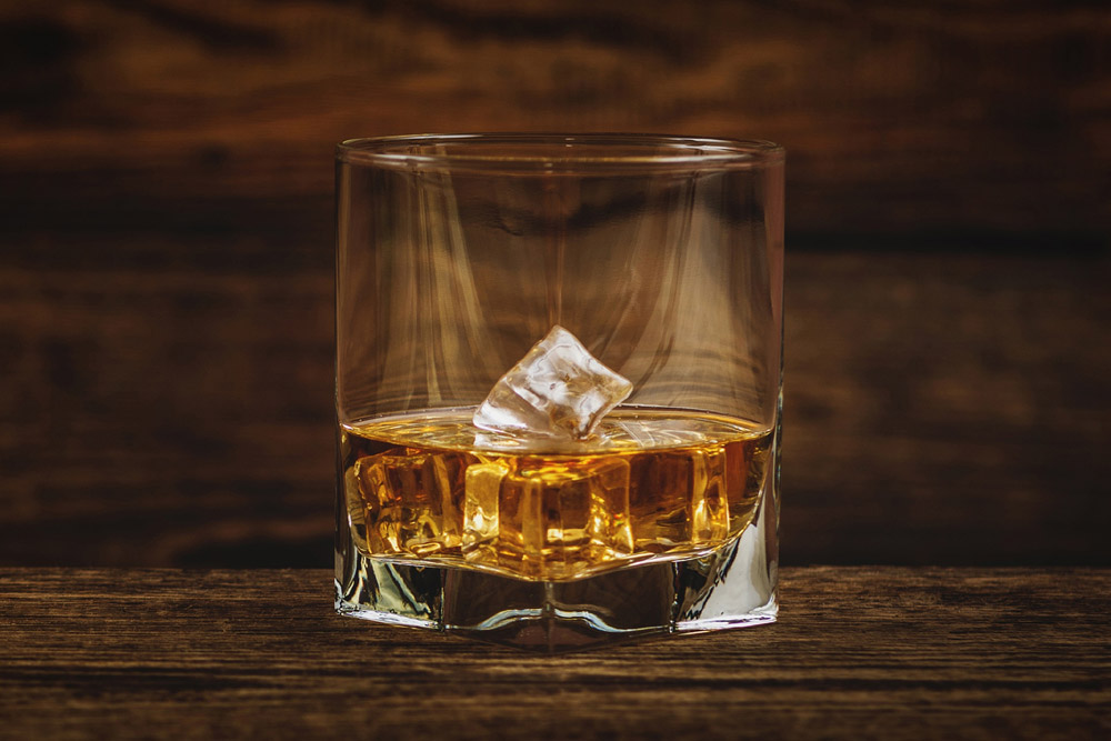 Dram of whisky with ice