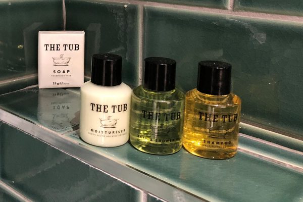 The Tub toiletries in a bathroom in a room in Parliament House Hotel