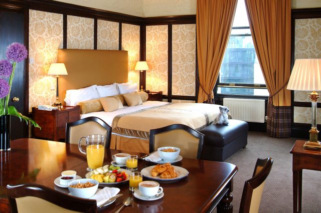 The Suite with breakfast on the grand table in Parliament House Hotel in Edinburgh