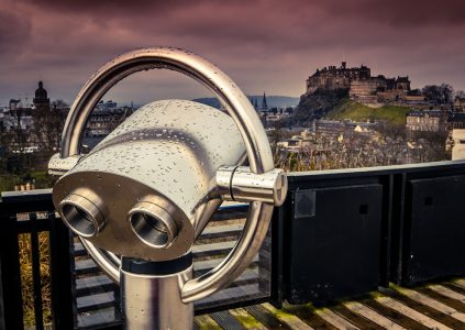 Binoculars looking across Edinburgh City to Edinburgh Castle
