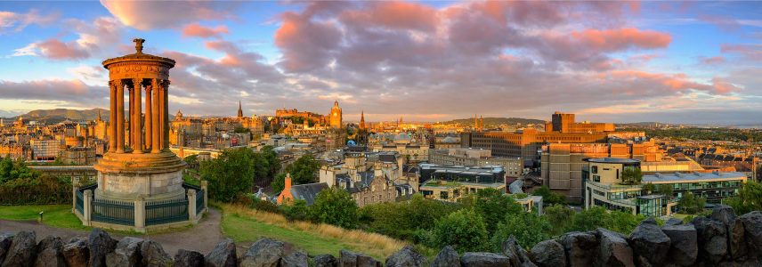 A view of Edinburgh City and Calton Hill at sunset