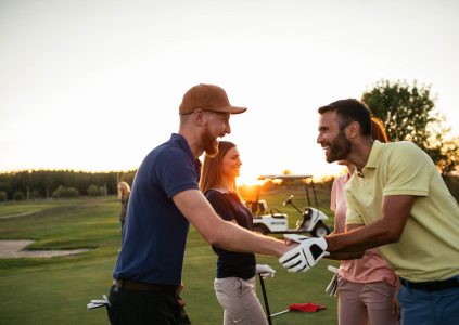Friends enjoying a round of golf together