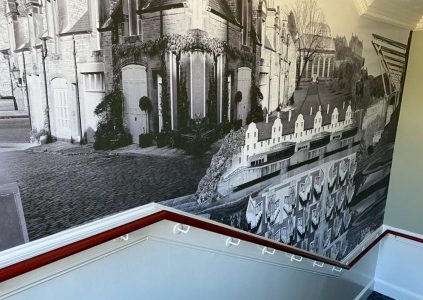 Photographic wallpaper of Edinburgh landmarks on a wall in Parliament House Hotel