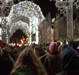 George Street in Edinburgh with Christmas lights and crowds