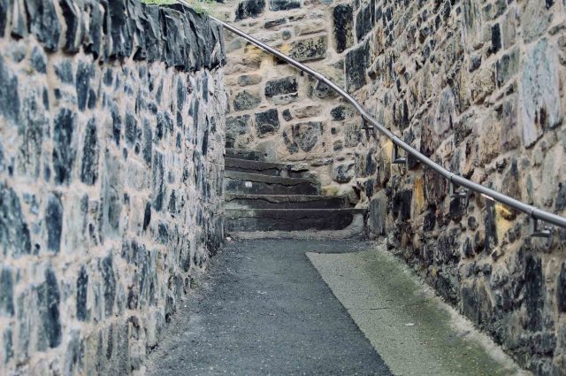 The steep hill and steps with walls either side of Jacobs Ladder in Edinburgh