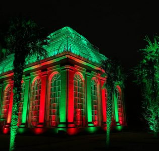 The glasshouse lit up at night in the Royal Botanical Gardens in Edinburgh