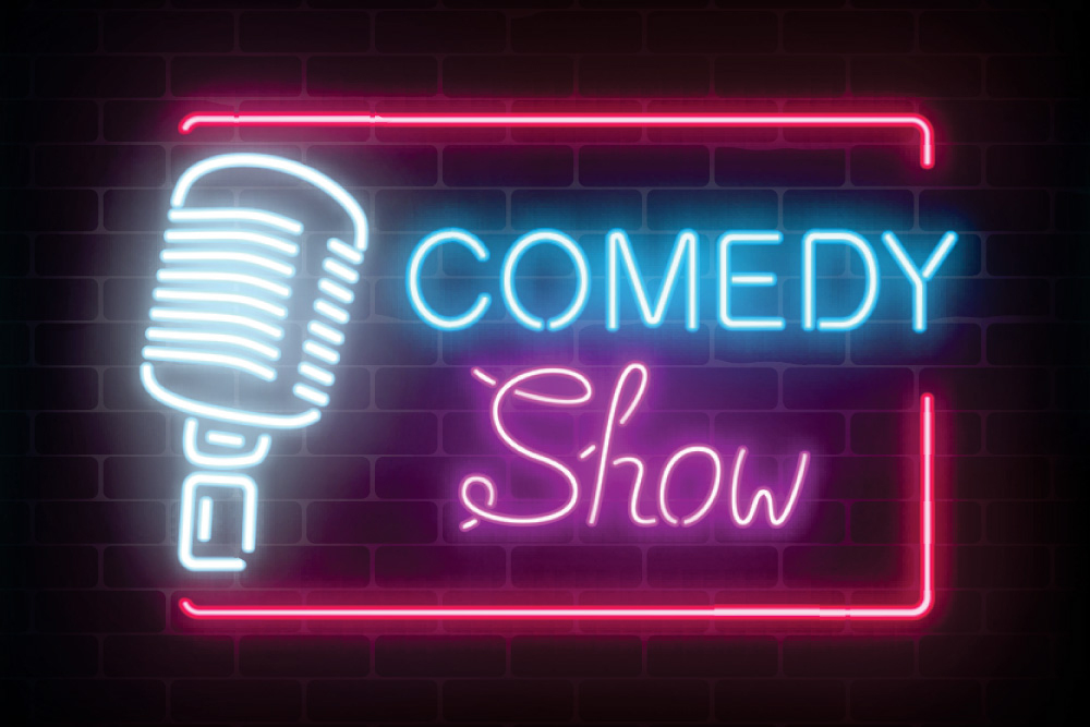Comedy Show neon sign on the wall