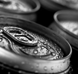 Close-up tops of beer cans