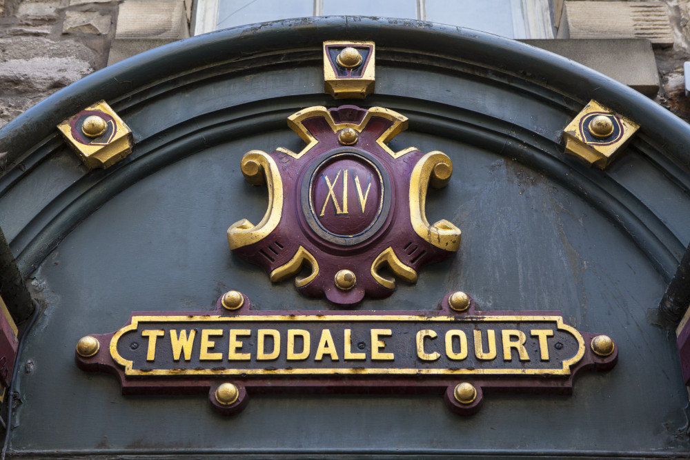 Sign over entrance to Tweeddale Court in Edinburgh