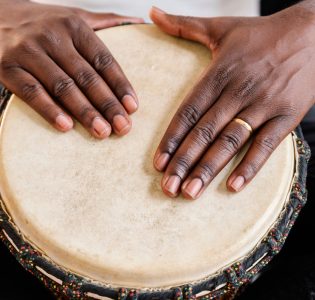 Drum being played by hand
