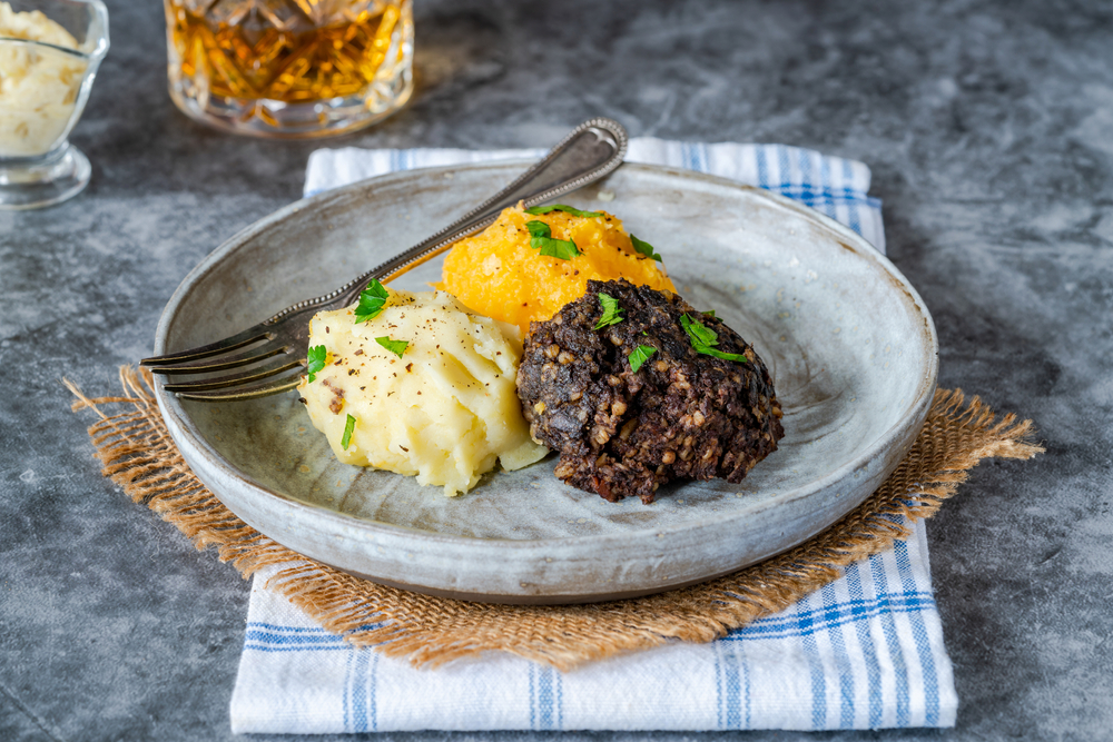 Haggis, neeps and tatties (haggis with turnips and potatoes) - traditional Scottish dish for Burns Night.