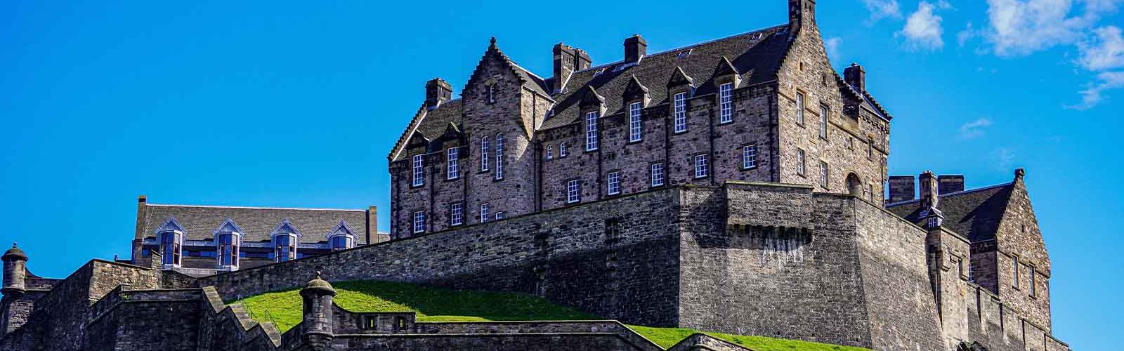 Edinburgh Castle with a blue sky.